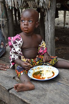 child eating food