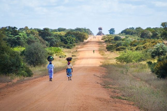 african-women-walking-along-road-